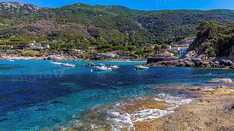 Boats anchored in the bay of Sant Andrea