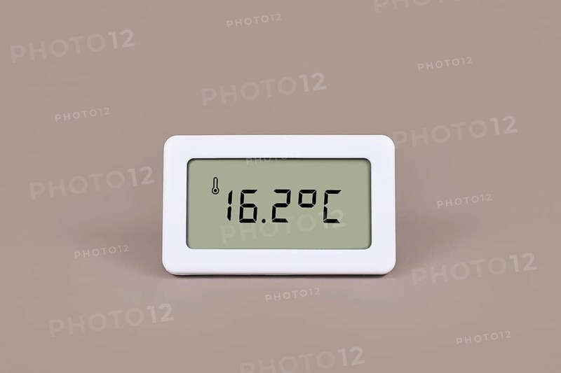 Digital thermometer showing cold room temperature of 16.7 degree Celsius