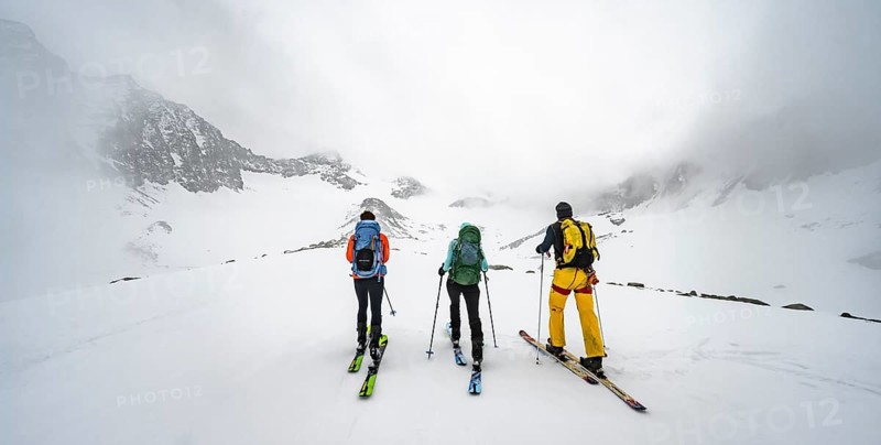 Three ski tourers climbing Sommerwandferner
