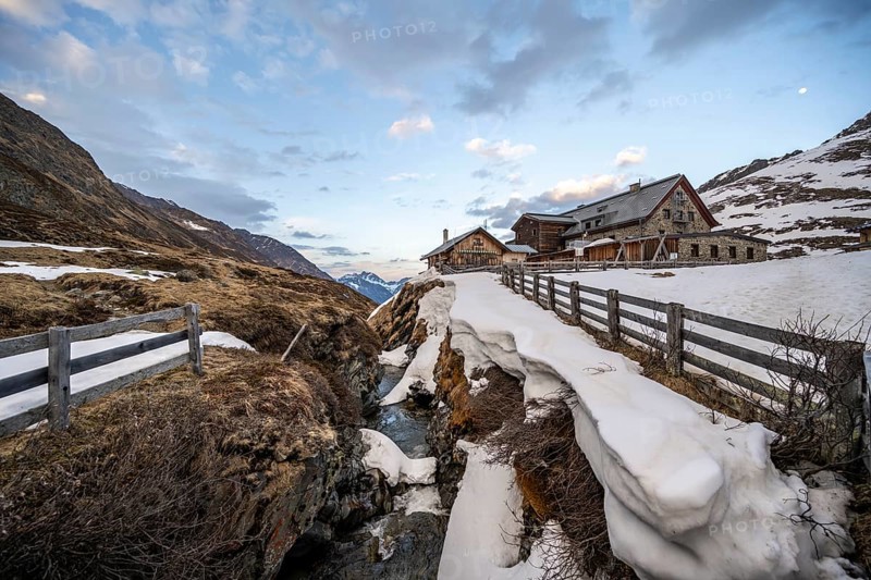 Oberbergbach gorge and Franz-Senn-Huette mountain hut in winter
