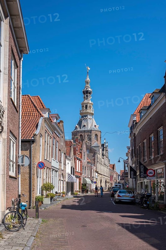 Town hall and historic house facades in Meelstraat