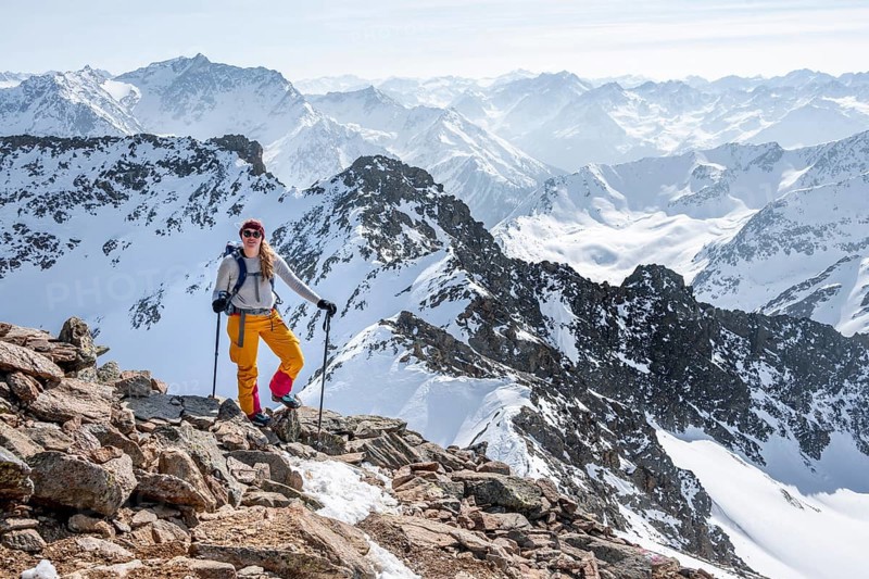 Mountaineer at the summit of the Sulzkogel