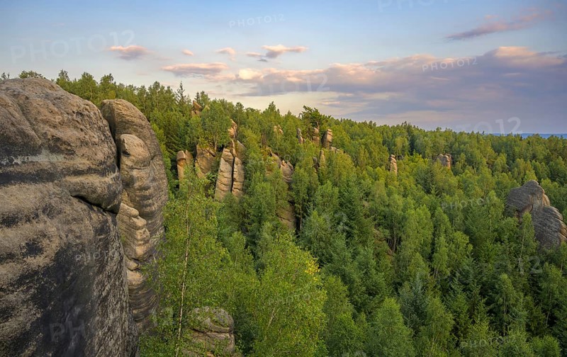 View of sandstone rocks in the evening light from a lookout pulpit