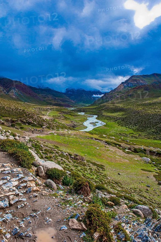 River snakes through as valley