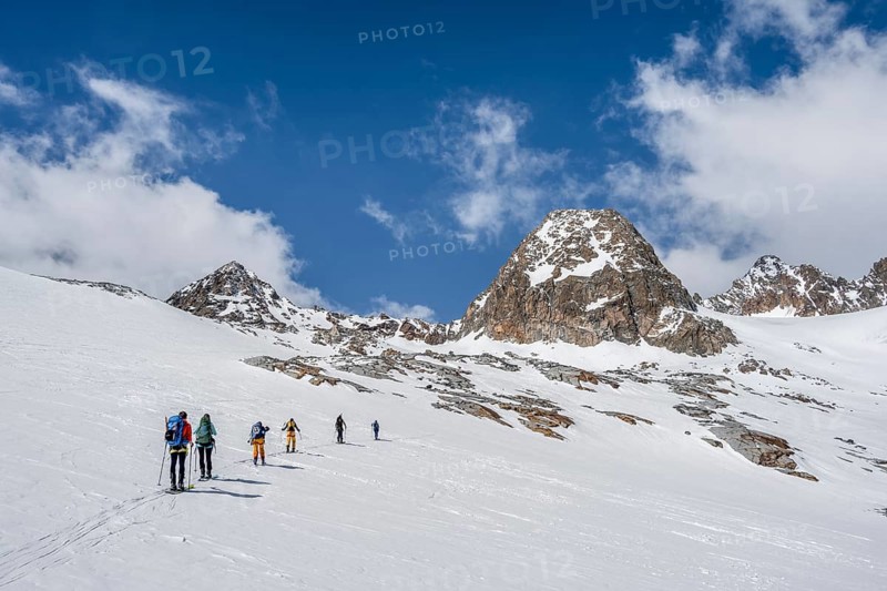 Group of ski tourers in winter in the mountains