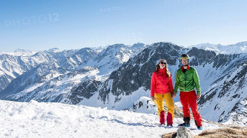 Two ski tourers at the summit