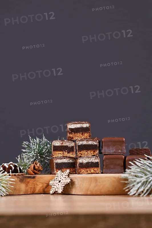 Halved taditional German sweets called 'Dominosteine'. Christmas candy consisting of gingerbread