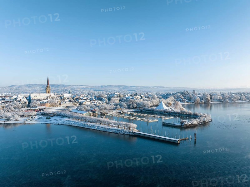 Aerial view of the town of Radolfzell on Lake Constance in winter with the harbour pier and Waeschbruckhafen