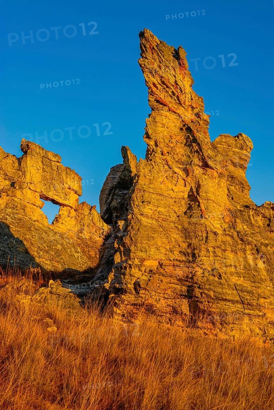 Savannah and huge rock formations at sunset in the Isalo National Park
