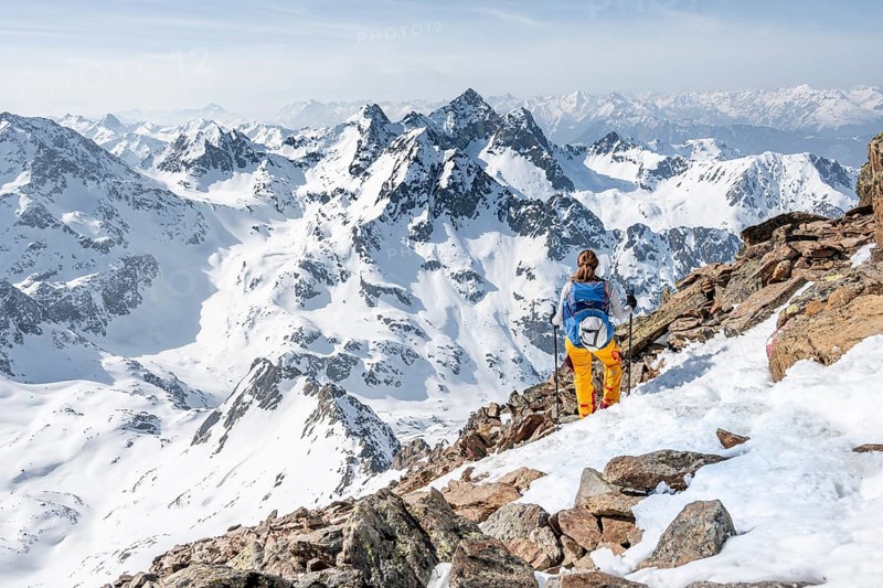 Mountaineer at the summit of the Sulzkogel
