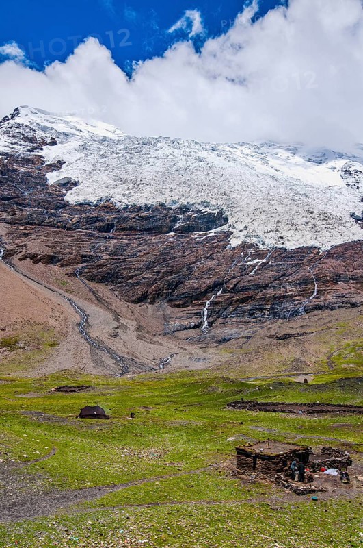 Hut below a glacier on the Karo-La Pass along the Freindship Highway