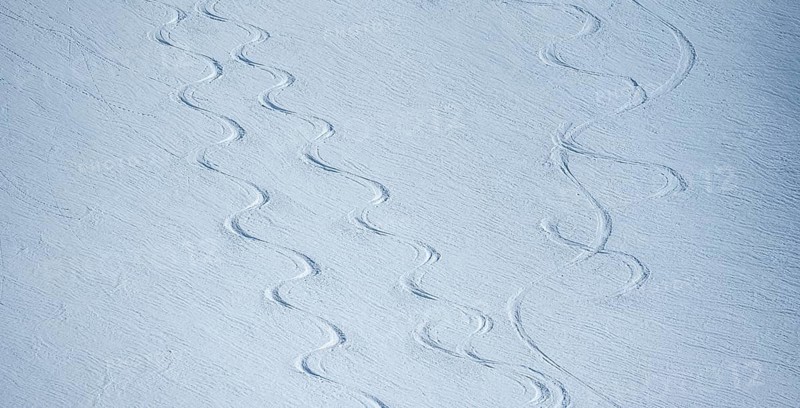 Single ski tracks in fresh snow