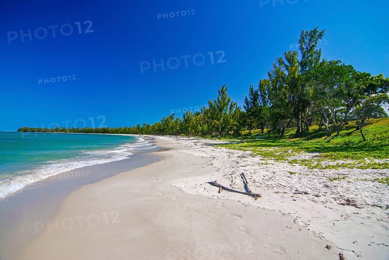 Long white sand beach in the east of the island Ile Sainte-Marie although Nosy Boraha
