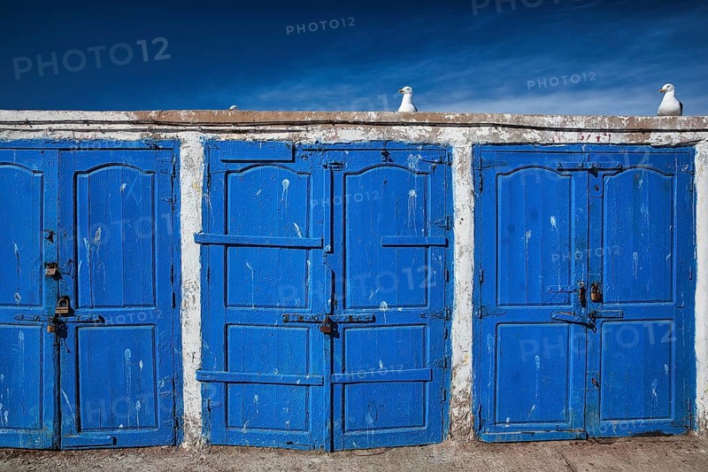 Blue doors with padlock