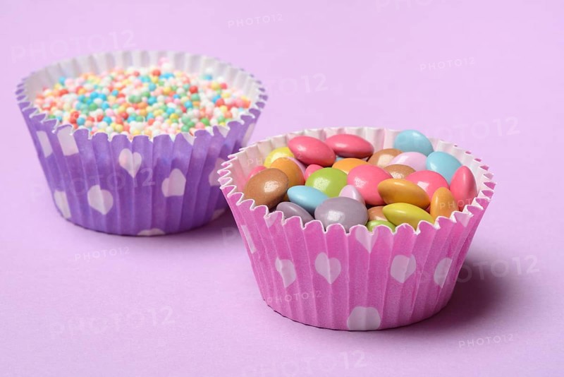 Chocolate lentils and love beads in paper moulds