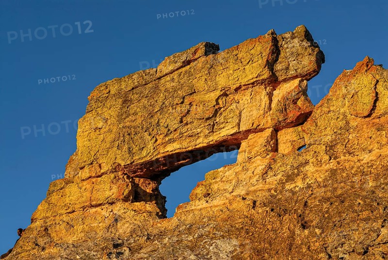 Savannah and huge rock formations at sunset in the Isalo National Park