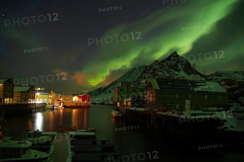 Small harbour with illuminated houses
