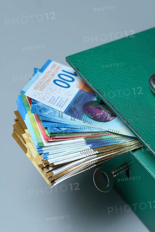 Cash box and Swiss banknotes