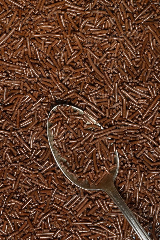 Chocolate sprinkles with teaspoon