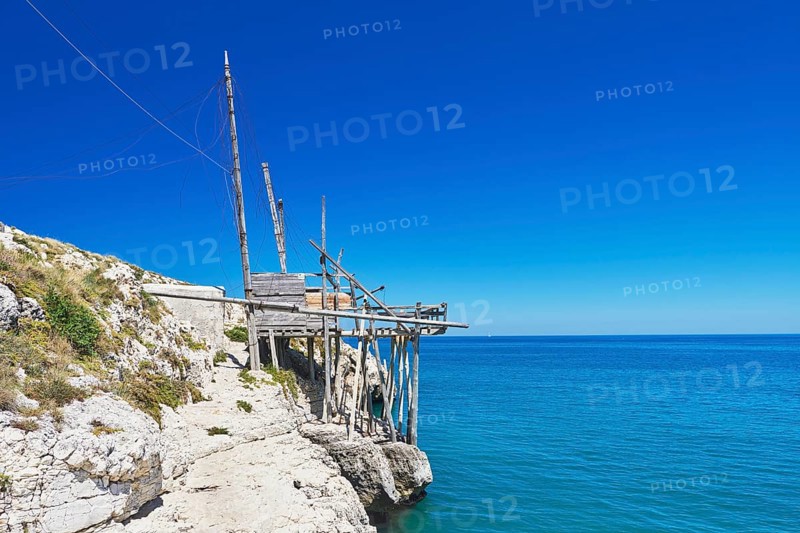 Fishing trabocco on rocky beach