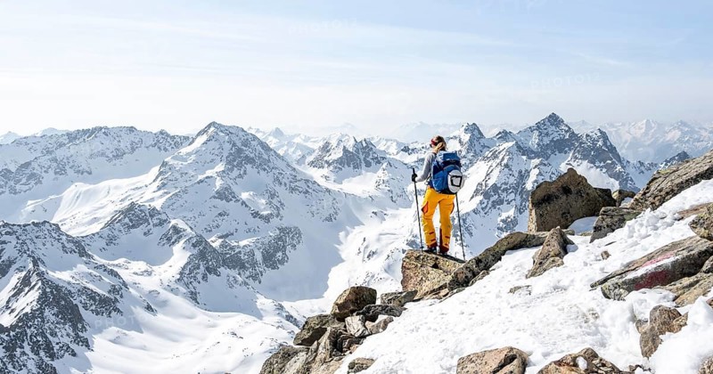 Mountaineer at the summit of the Sulzkogel