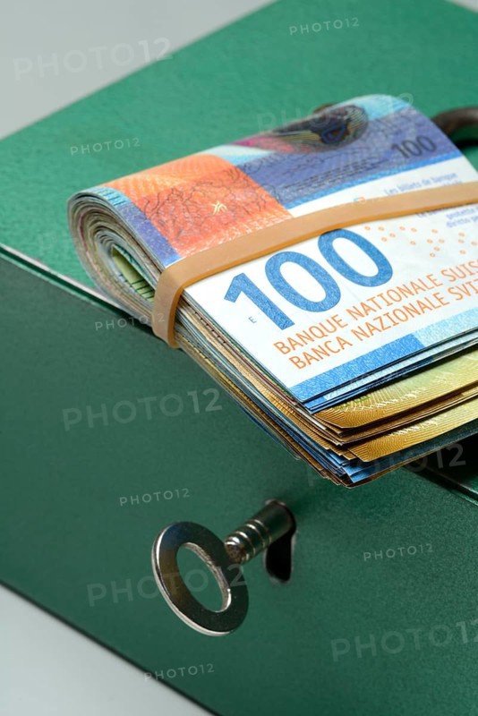 Cash box and Swiss banknotes