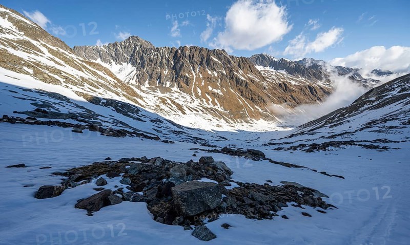 View of rocky mountain ridge into Oberbergtal