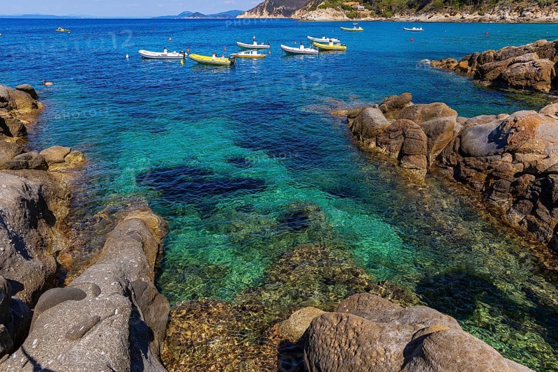 Boats anchored in the bay of Sant Andrea