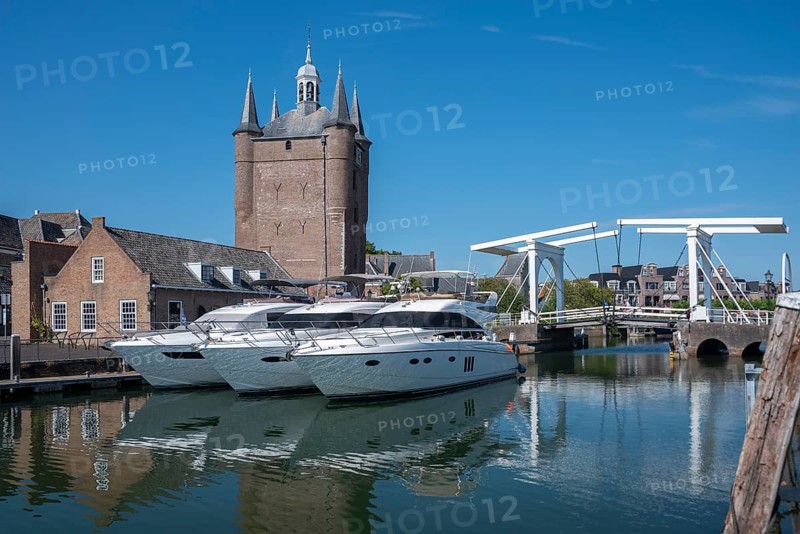 Motor yachts in front of the Zuidhavenpoort at the Oude Haven