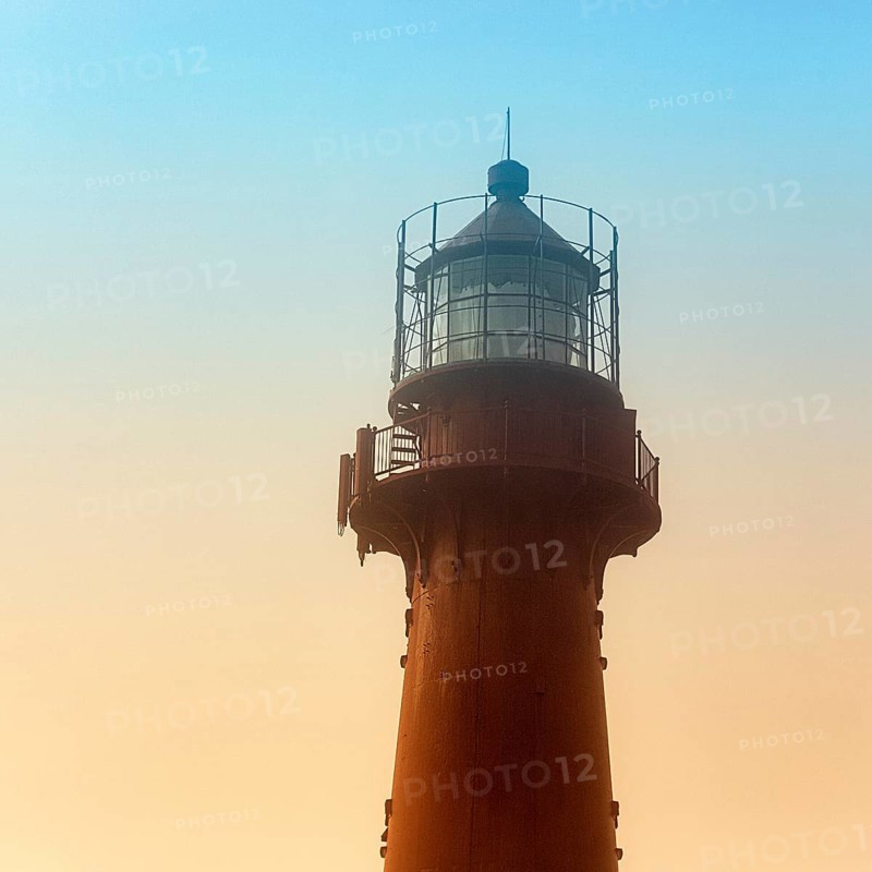 Red lighthouse in the haze