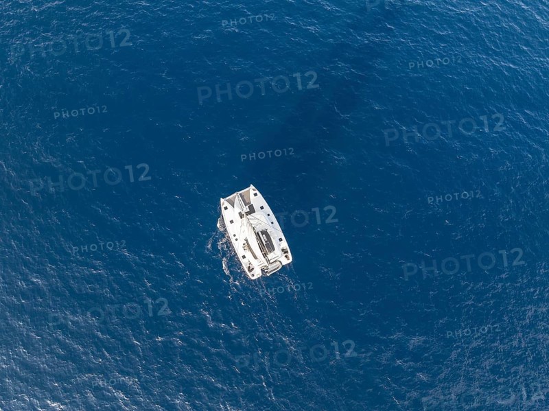 Sailing catamaran in full sail