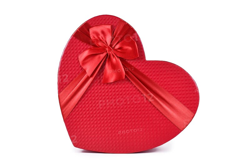 Red heart shaped Valentine's day gift box on white background