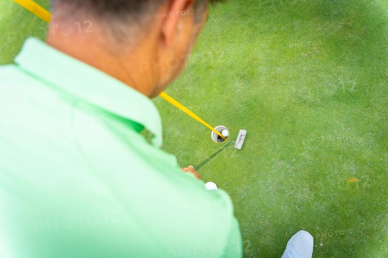 Man playing golf