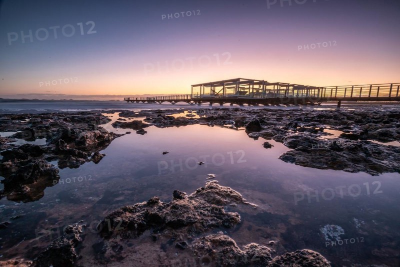 Long exposure at sunrise at the coast near Corralejo
