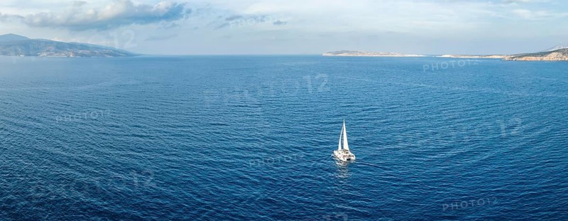 Sailing catamaran in full sail