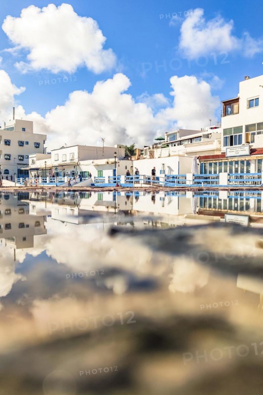 Typical white buildings and restaurants