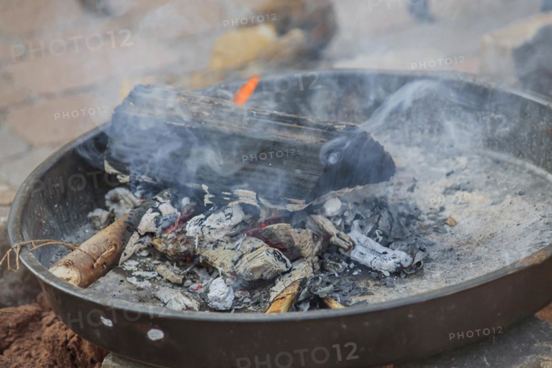 Fire bowl with burning wood