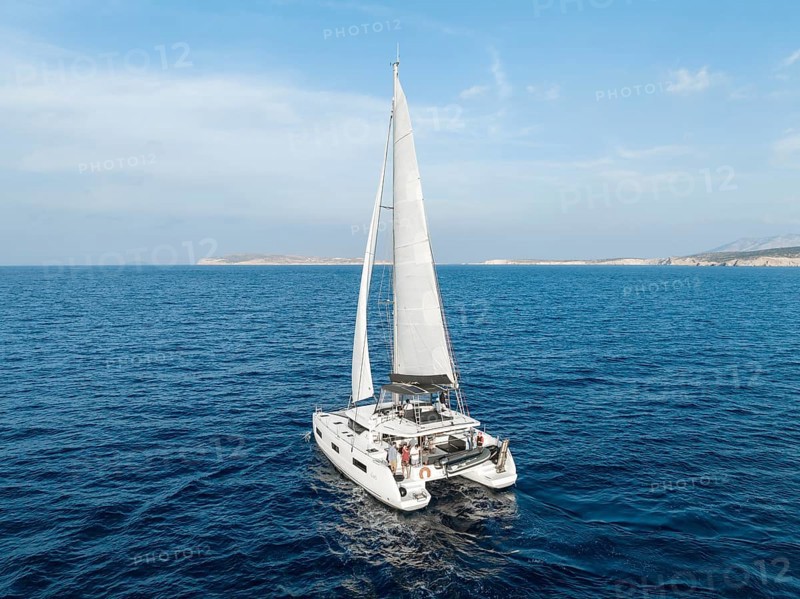 Sailing catamaran in full sail