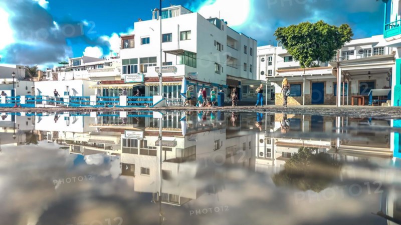 Typical white buildings and restaurants