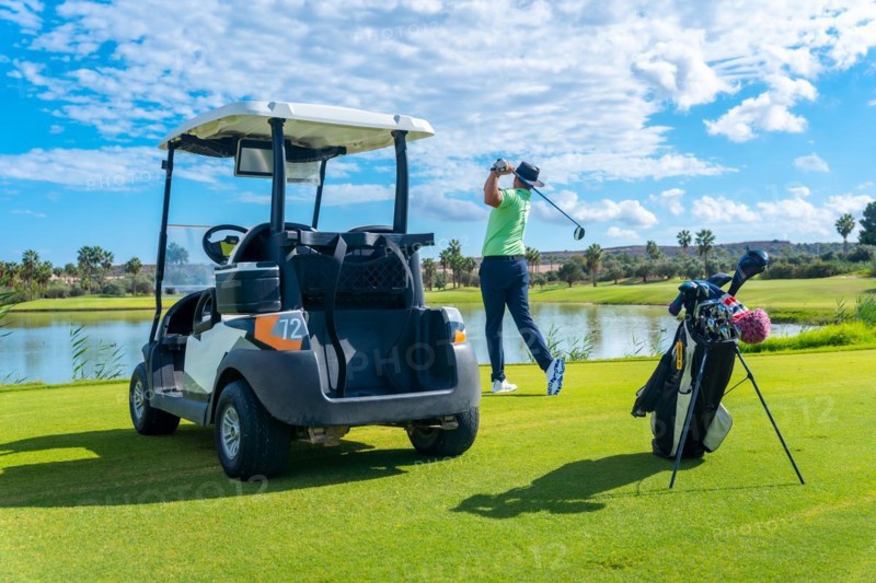 Playing professional golf on golf course