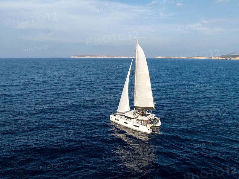 Sailing catamaran in full sail