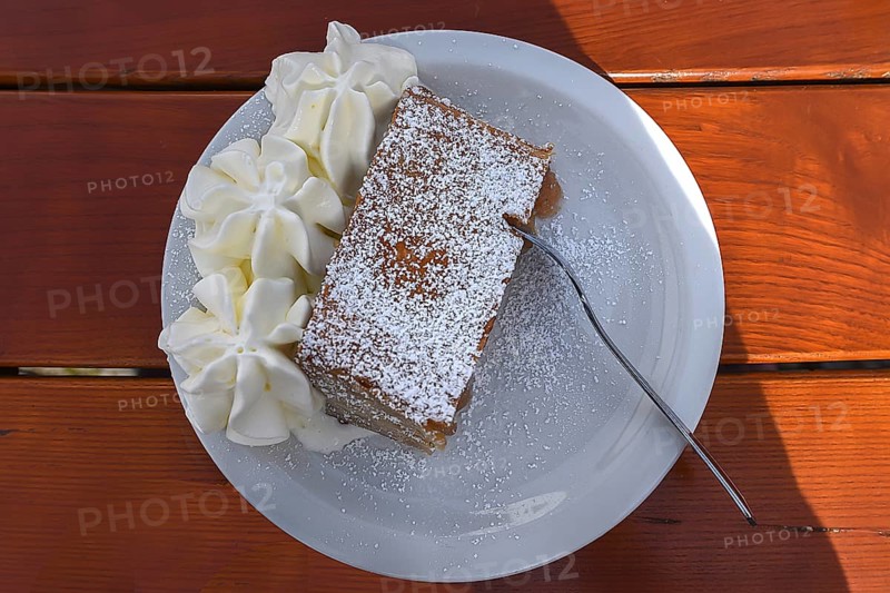 Apple strudel with cream