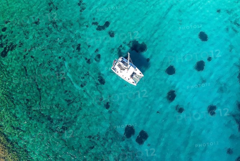 Sailing catamaran from above