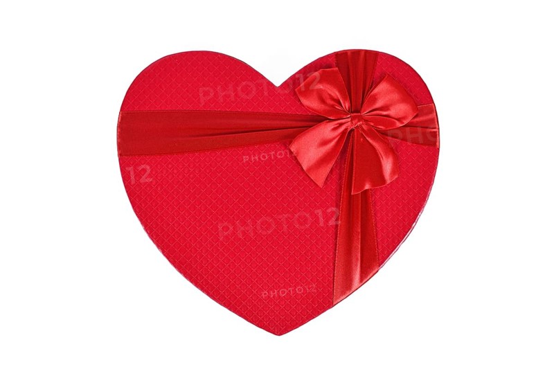 Top view of red heart shaped Valentine's day gift box on white background