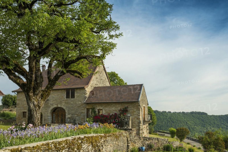 Old walled holiday home with flower garden