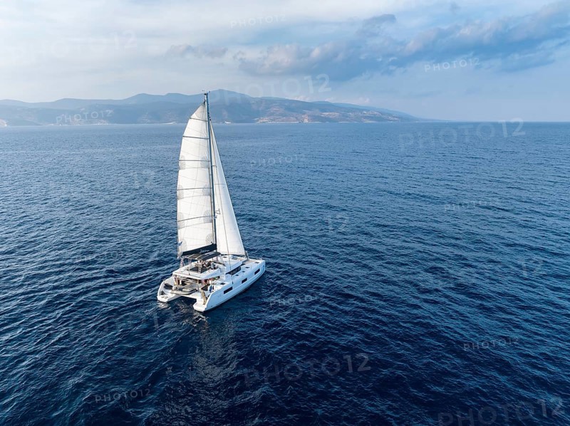 Sailing catamaran in full sail