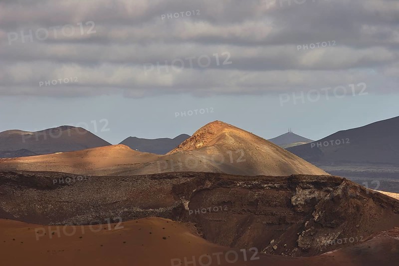 Different coloured lava hills