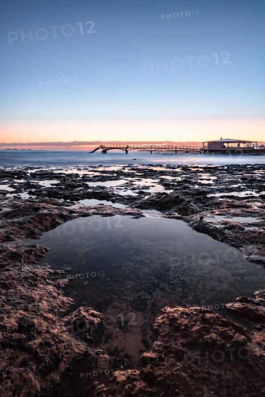Long exposure at sunrise at the coast near Corralejo