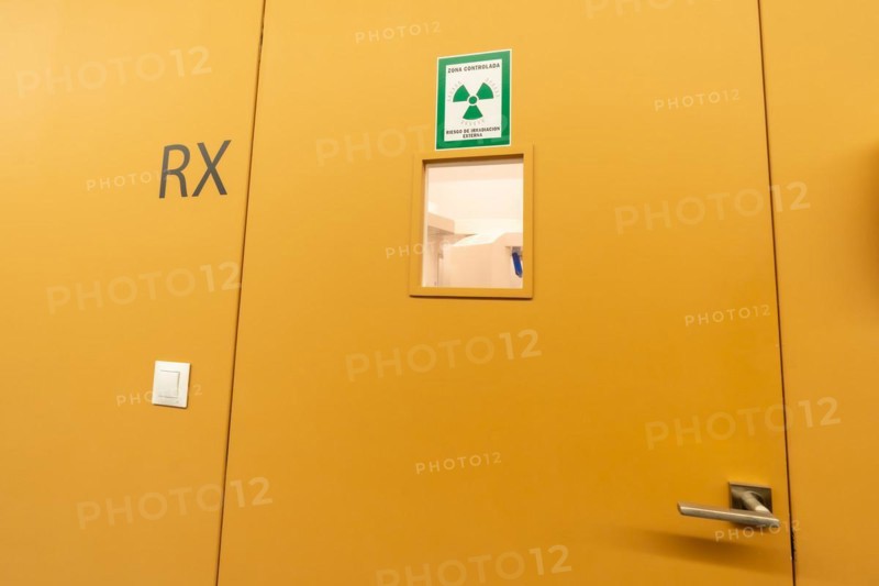 Corridor of a dental clinic with multiple boxes and the x-ray room
