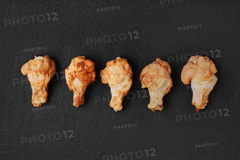 Semifinished frozen chicken meat ready for deep frying